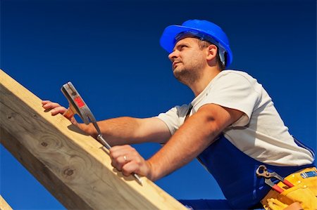 roof hammer - Carpenter on top of roof structure inspecting the building Stock Photo - Budget Royalty-Free & Subscription, Code: 400-05370277