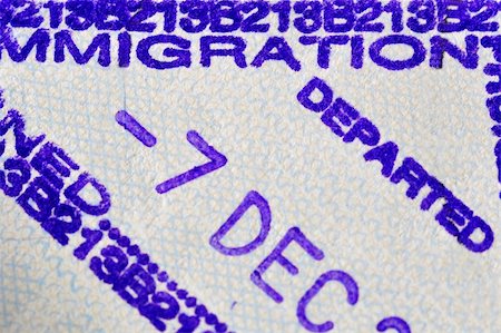 Immigration departed stamp, made on a airport when someone leaves the visiting country Stock Photo - Budget Royalty-Free & Subscription, Code: 400-05370386