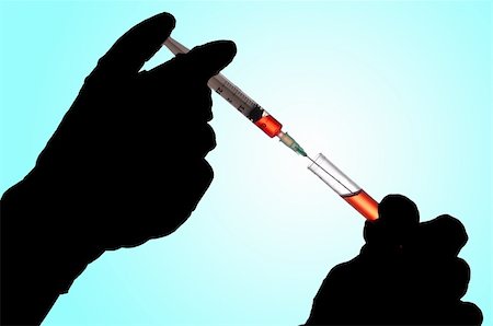 Hand holding a syringe and taking a blood sample from a tube for analysis Foto de stock - Super Valor sin royalties y Suscripción, Código: 400-05370451
