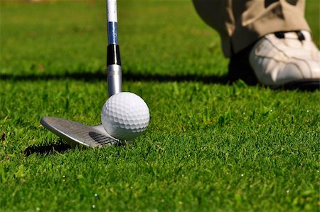 simsearch:400-05370464,k - Real golfer ready to strike the ball Stock Photo - Budget Royalty-Free & Subscription, Code: 400-05370466