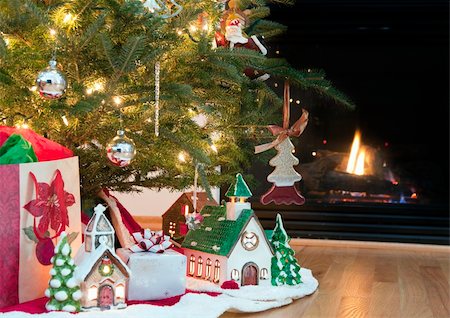 Image of lighted ceramic houses under a Christmas tree Stock Photo - Budget Royalty-Free & Subscription, Code: 400-05370523