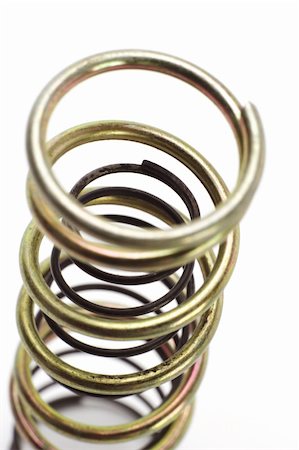 simsearch:400-06392816,k - Metal spring coils arranged one inside another Foto de stock - Royalty-Free Super Valor e Assinatura, Número: 400-05370679