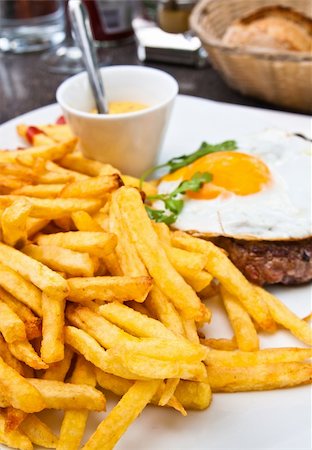 Egg and fries - classical english breakfast with egg and fries Stock Photo - Budget Royalty-Free & Subscription, Code: 400-05371210