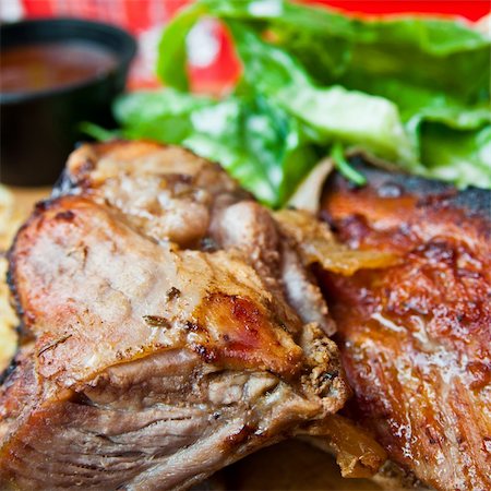 Grilled steak - Grilled meat ribs on the plate with hot sauce Stock Photo - Budget Royalty-Free & Subscription, Code: 400-05371249