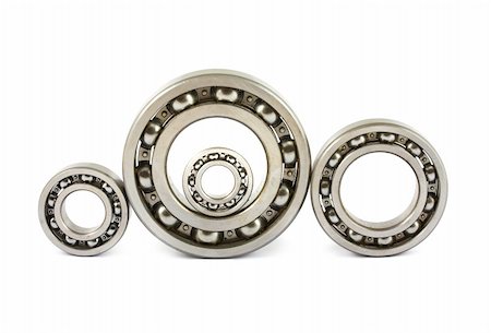 simsearch:400-06891668,k - Four steel ball bearings isolated on a white background Fotografie stock - Microstock e Abbonamento, Codice: 400-05371367