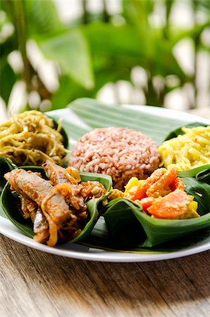 indonesian food in bali, several curries and rice Stockbilder - Microstock & Abonnement, Bildnummer: 400-05372168