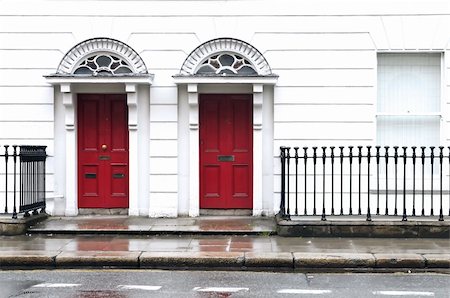 simsearch:700-05389534,k - Red, two entrance door, view from street Fotografie stock - Microstock e Abbonamento, Codice: 400-05373944