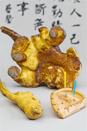 Acupuncture needles, Ginseng and Reishi mushroom Photographie de stock - Aubaine LD & Abonnement, Code: 400-05373950