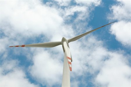 simsearch:400-03912255,k - Wind turbine on blue sky Stock Photo - Budget Royalty-Free & Subscription, Code: 400-05384058