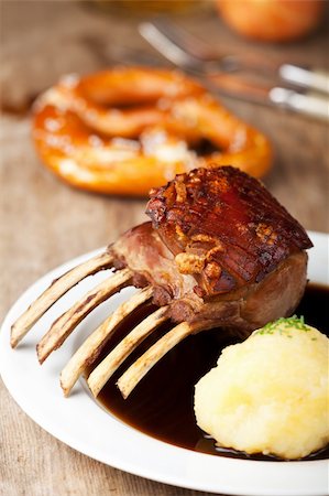 closeup of roasted suckling pig meal Stock Photo - Budget Royalty-Free & Subscription, Code: 400-05384252