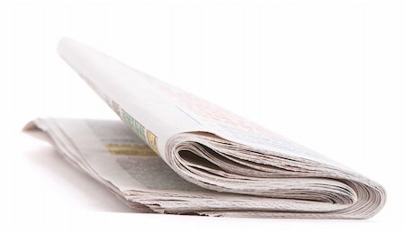 Folded morning newspaper isolated over white background Stock Photo - Budget Royalty-Free & Subscription, Code: 400-05384459
