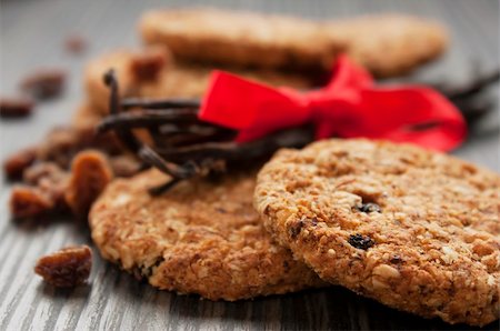 Pile of wholegrain cookies with raisins and nuts. Stock Photo - Budget Royalty-Free & Subscription, Code: 400-05384496
