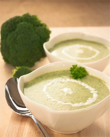 simsearch:400-06088770,k - Rich vegetable broccoli soup with cream garnish Stock Photo - Budget Royalty-Free & Subscription, Code: 400-05384519