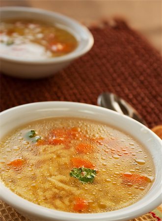 simsearch:400-06066801,k - Clear vegetable soup close up. Shallow depth of field. Stock Photo - Budget Royalty-Free & Subscription, Code: 400-05384522