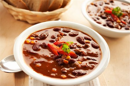 steaming soup - Chilli con carne with red pepper and parsley Stock Photo - Budget Royalty-Free & Subscription, Code: 400-05384536