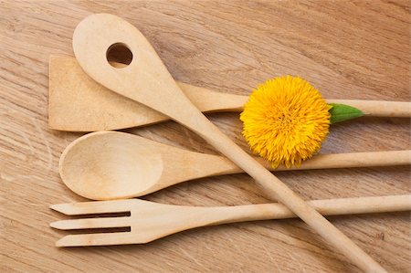 flower table kitchen - Wooden kitchen utensils on the wooden cutting board. Stock Photo - Budget Royalty-Free & Subscription, Code: 400-05384829