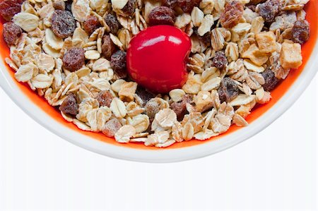 simsearch:400-04866989,k - Close up of a sweet cherry in muesli and raisins. Stockbilder - Microstock & Abonnement, Bildnummer: 400-05384832