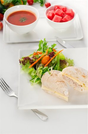 simsearch:400-07319721,k - tuna fish and cheese sandwich with fresh mixed salad ,watermelon and gazpacho soup on side,with fresh vegetables on background Stockbilder - Microstock & Abonnement, Bildnummer: 400-05384908