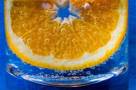 Lemon in the glass of sparkling water Stock Photo - Budget Royalty-Free & Subscription, Code: 400-05384982