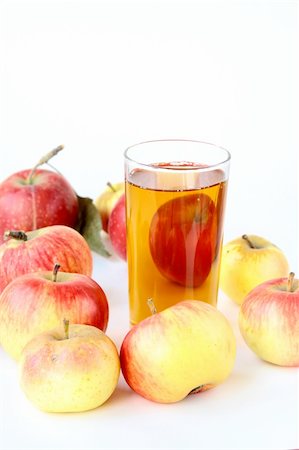 Apple juice in glass and fresh apples on white background Stock Photo - Budget Royalty-Free & Subscription, Code: 400-05385716