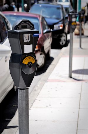 a parking meter on the line Foto de stock - Super Valor sin royalties y Suscripción, Código: 400-05385853