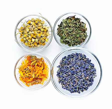 Bowls of dry medicinal herbs on white background from above Stock Photo - Budget Royalty-Free & Subscription, Code: 400-05386045