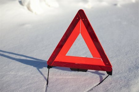 simsearch:400-07252682,k - warning triangle on snow serface Fotografie stock - Microstock e Abbonamento, Codice: 400-05386139