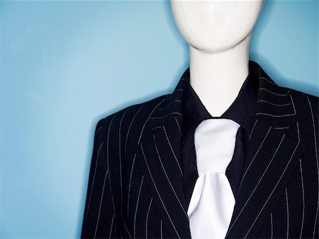 Photo of faceless dummy model dressed in business suit and tie Stock Photo - Budget Royalty-Free & Subscription, Code: 400-05386145