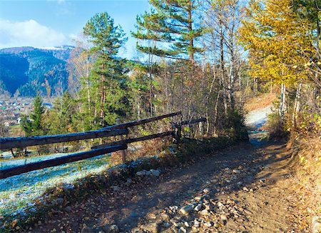 Country dirty road and first autumn hoarfrost on mountain village outskirts Stock Photo - Budget Royalty-Free & Subscription, Code: 400-05386538