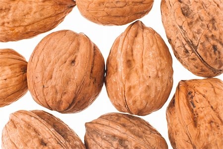 simsearch:400-04820004,k - Walnuts in closeup isolated on white background. Stockbilder - Microstock & Abonnement, Bildnummer: 400-05386972