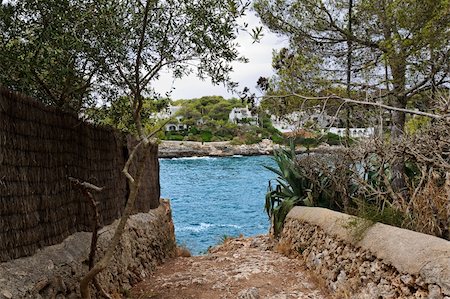 simsearch:400-05387791,k - Narrow passage to the sea on Mallorca, Spain Stock Photo - Budget Royalty-Free & Subscription, Code: 400-05387788