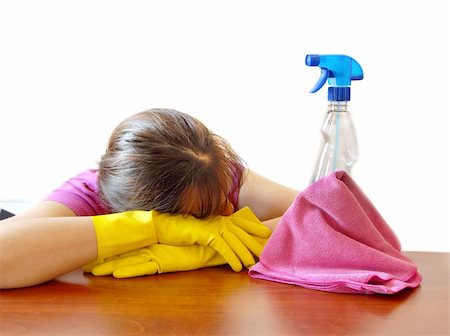 young woman in rubber gloves  leaning on desk, bored of cleaning Stock Photo - Budget Royalty-Free & Subscription, Code: 400-05388329