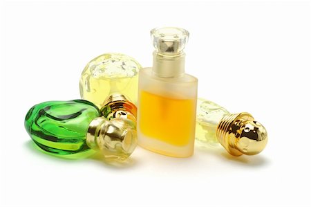 simsearch:700-06892568,k - Four bottles of perfume on white background Stock Photo - Budget Royalty-Free & Subscription, Code: 400-05388461