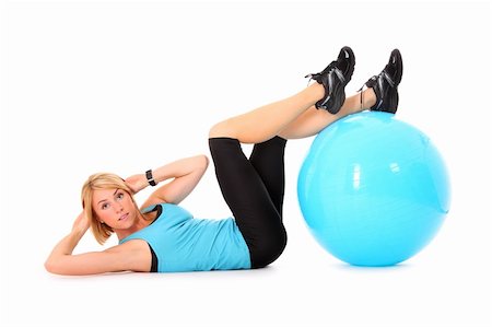 female sit ups black background - A picture of a beautiful young woman doing sit-ups with a ball over white background Stock Photo - Budget Royalty-Free & Subscription, Code: 400-05388743