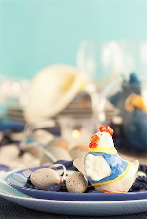 restaurant in blue with table setting - Easter table setting in blue and white tones with chicken and easter eggs. Stock Photo - Budget Royalty-Free & Subscription, Code: 400-05389020