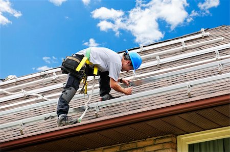 solar panel house - Man installing rails for solar panels on residential house roof Stock Photo - Budget Royalty-Free & Subscription, Code: 400-05380330