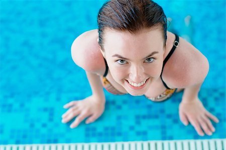 rosspetukhov (artist) - Close-up portrait of a smiling young beautiful girl at the swimming pool Photographie de stock - Aubaine LD & Abonnement, Code: 400-05381212