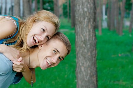 rosspetukhov (artist) - Close-up portrait of a happy teenage couple at the park Photographie de stock - Aubaine LD & Abonnement, Code: 400-05381234