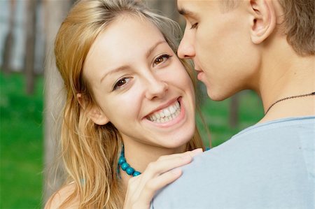 rosspetukhov (artist) - Close-up portrait of a happy teenage couple at the park Photographie de stock - Aubaine LD & Abonnement, Code: 400-05381230