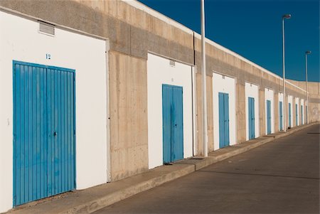 A row of blue doors, diagonal take Stock Photo - Budget Royalty-Free & Subscription, Code: 400-05381521