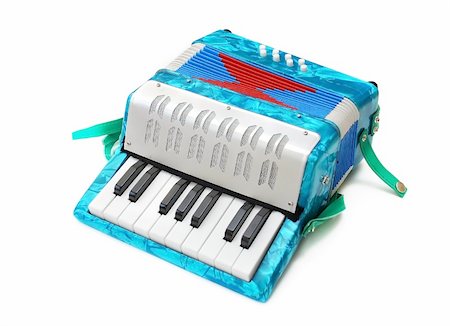 small blue children accordion toy isolated over white Stock Photo - Budget Royalty-Free & Subscription, Code: 400-05381647