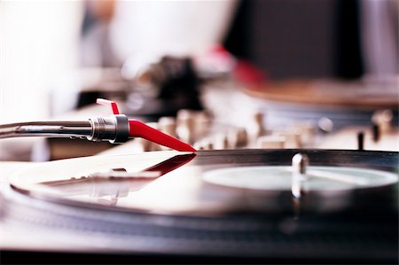 dj spinning vinyl - Vinyl record spinning on DJ player Stock Photo - Budget Royalty-Free & Subscription, Code: 400-05381720