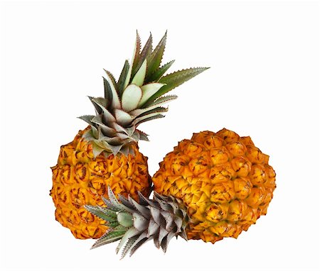 Two fresh bright orange pineapples isolated on white background Foto de stock - Super Valor sin royalties y Suscripción, Código: 400-05381791