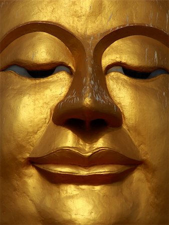 Close up shot of the smile Buddha's face Stock Photo - Budget Royalty-Free & Subscription, Code: 400-05381909