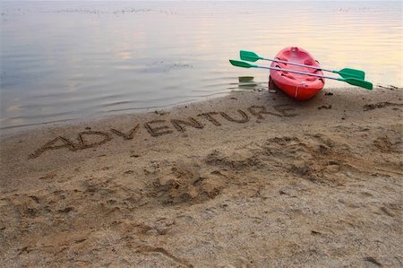 simsearch:400-03956564,k - Boat lying near the river, ready for adventure. Fotografie stock - Microstock e Abbonamento, Codice: 400-05381902