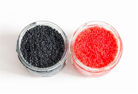 the red and black caviar in glass jars on withe background Foto de stock - Super Valor sin royalties y Suscripción, Código: 400-05382249