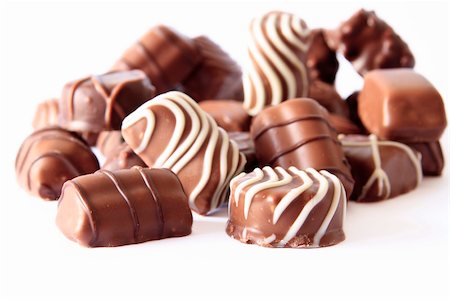 chocolate candy isolated on white Foto de stock - Super Valor sin royalties y Suscripción, Código: 400-05382268