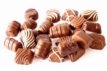chocolate candy assorted isolated on white Foto de stock - Super Valor sin royalties y Suscripción, Código: 400-05382269