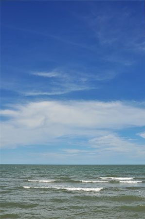 phanlop88 (artist) - Empty beach with sun Fotografie stock - Microstock e Abbonamento, Codice: 400-05382339