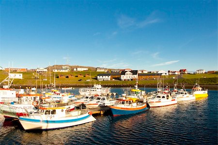 scandinavian fishing boat - Beauty small colorfull fishing boat - Djupivogur, Iceland. Summer day. Stock Photo - Budget Royalty-Free & Subscription, Code: 400-05382349